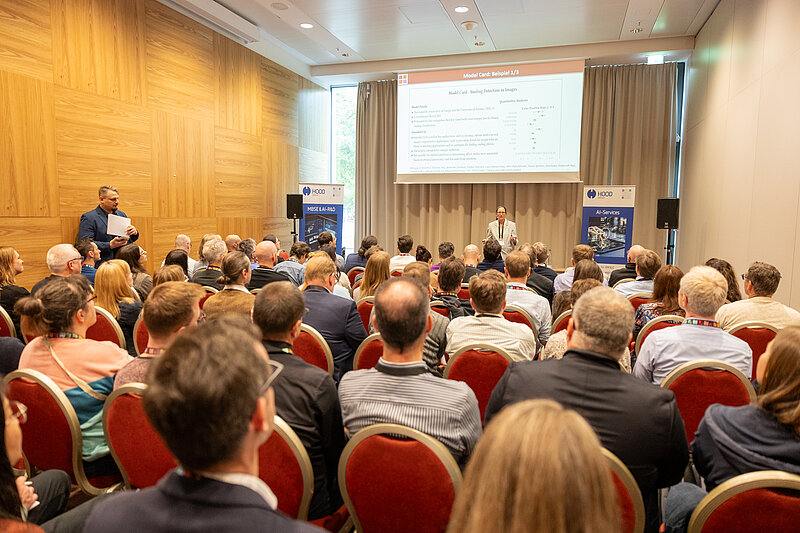 A man is giving a presentation to an audience.